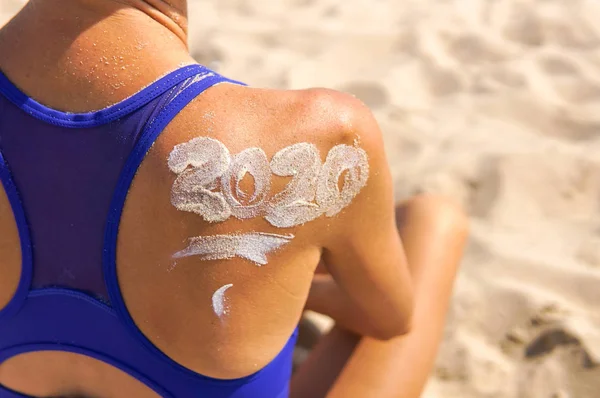 Christmas Time Spent Beach Summer Young Woman Wearing Bikini Sunlotion — Stock Photo, Image