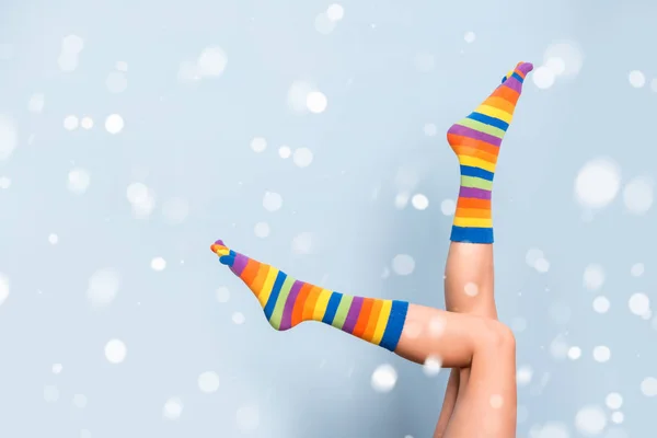 Funny Playful Woman Legs Wearing Colorful Socks Blue Background Falling — Stock Photo, Image