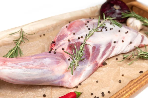 Raw lamb leg ready for cooking with garlic and rosemary — Stock Photo, Image