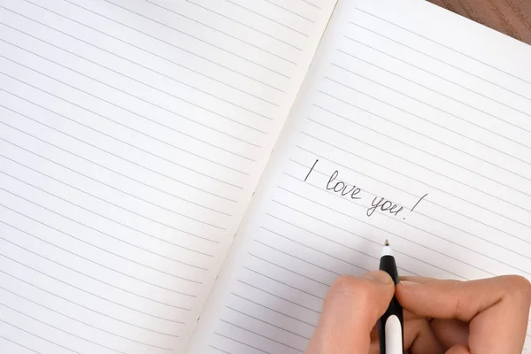 Beschriftung ich liebe dich geschrieben auf linierten Notizblock — Stockfoto