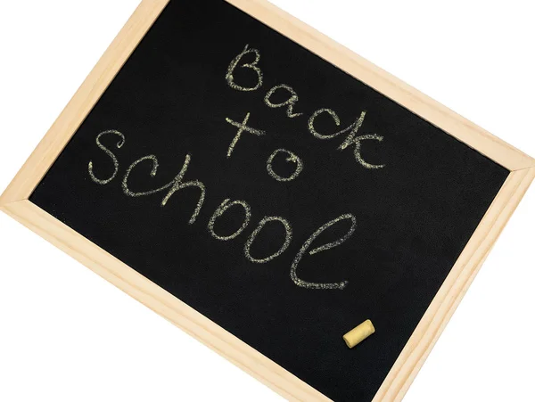 Inscription Back To School on black chalkboard, close up. — Stock Photo, Image