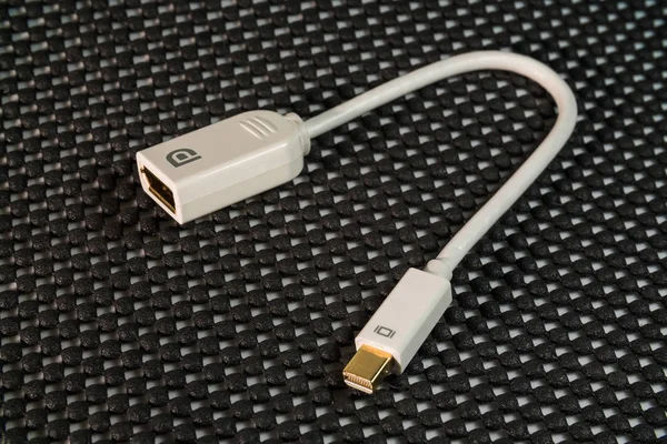 Mini male DisplayPort to female DisplayPort cable and adapter — Stock Photo, Image