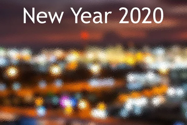 Feliz año nuevo 2020 con el brillo azul marino oscuro Bokeh luz brillante fondo, celebración de vacaciones —  Fotos de Stock