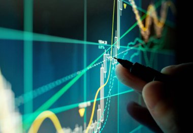A Stock Trader Checking Chart Fundamentals clipart
