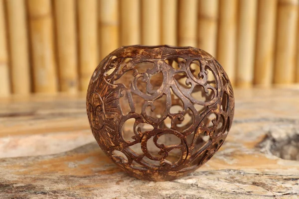 Coconut shell carving. Handicraft of indigenous people in Bali,