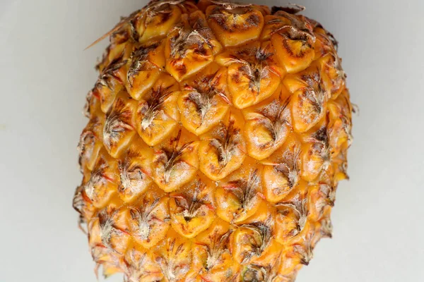 Close-up de pele de abacaxi maduro. Textura de abacaxi fresco. Abdominais — Fotografia de Stock
