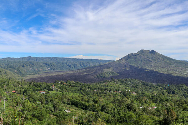 Panorama of Mount Batur or Gunung Batur, an active volcano located at the center of caldera the surrounding area on the island of Bali, Indonesia. Best background for your project.