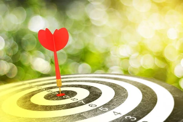 Red arrow on target dart — Stock Photo, Image
