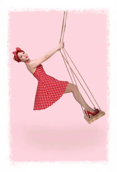 Vertical photo on a pink background of a naughty girl in a polka — 스톡 사진