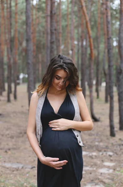 Pregnant Woman Put Her Hands Her Belly Looks — Stock Photo, Image
