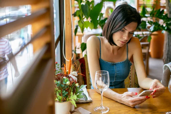 Lovely Young Woman Jeans Sundress Sadly Sits Table Cafe Looks — Stock Photo, Image