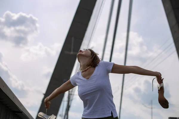 Slender European White Shirt Stands Bridge Her Arms Outstretched Side — Stock Photo, Image