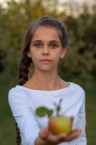 Pretty Girl Long Braid Stands Middle Green Garden Holds Out — Stock Photo, Image