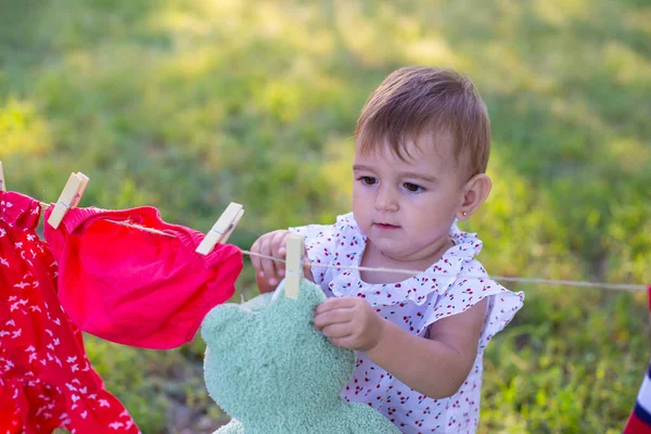 Little Girl Washed Her Soft Toy Tries Hang Rope Dry — Stock Photo, Image