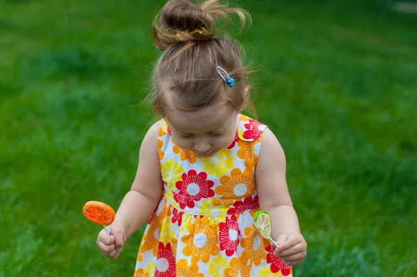 Cute Baby Bright Summer Dress Playing Hide Seek Outdoors — Stock Photo, Image