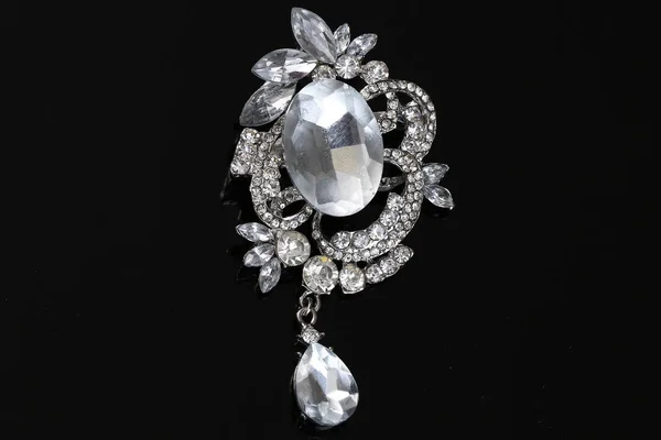 Brooch with silver flowers and jewellry — 스톡 사진