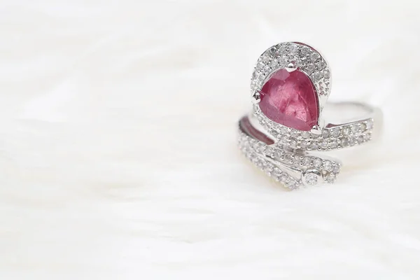 Pink gemstone on diamond ring — Stock Photo, Image