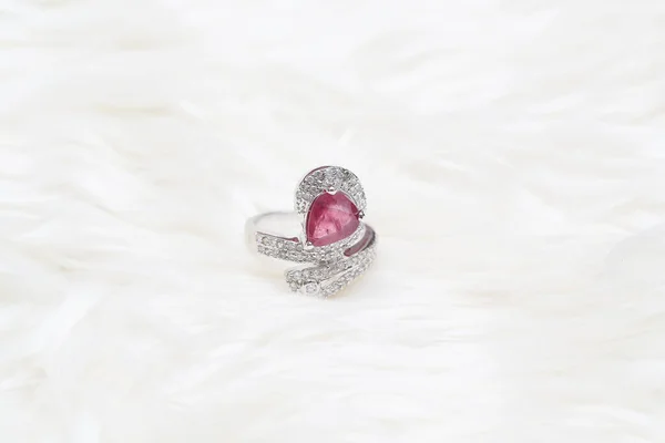 Pink gemstone on diamond ring — Stock Photo, Image