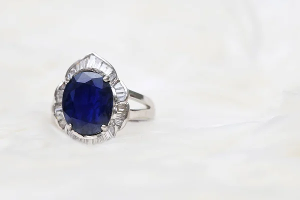 Blue gemstone on silver ring — Stock Photo, Image