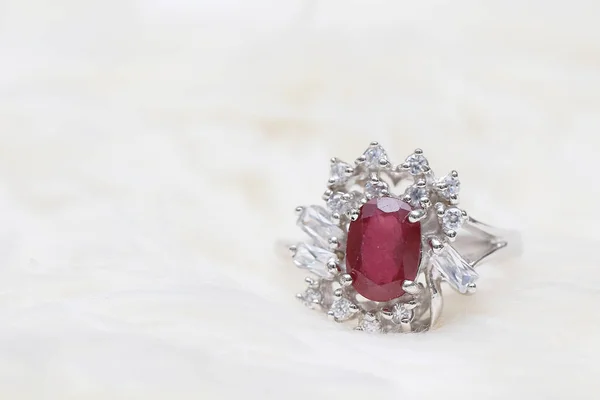 Red gemstone on diamond ring — 스톡 사진