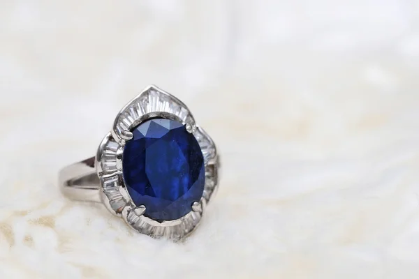 blue gem and diamond ring