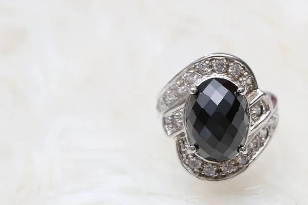 Jasper black gemstone on diamond ring — Stock Photo, Image