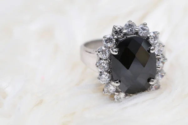 Jasper black gemstone on diamond ring — Stock Photo, Image