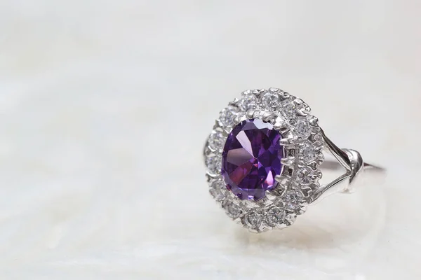 Purple gemstone on diamond ring — 스톡 사진