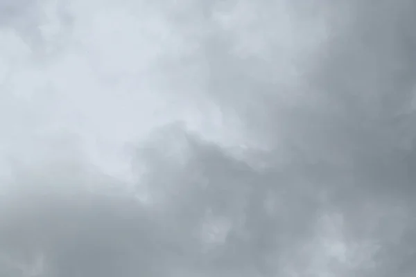 Nuvem chuvosa (ou chuva), fundo de cor cinza — Fotografia de Stock