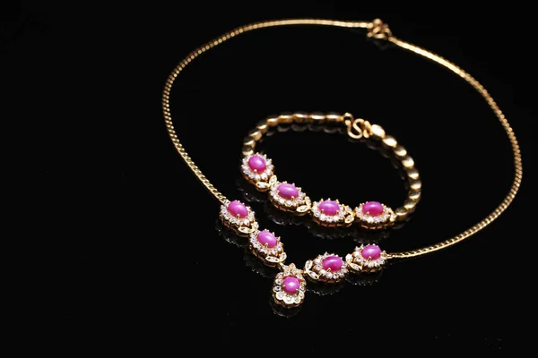 Golden jewellery,pink gem necklace — 스톡 사진