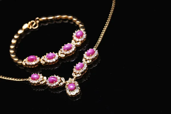 Golden jewellery,pink gem necklace — 스톡 사진