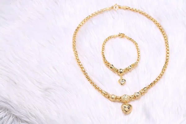 Golden heart pendant , Neck lace, Golden bracelet — 스톡 사진