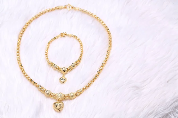 Golden heart pendant , Neck lace, Golden bracelet — 스톡 사진