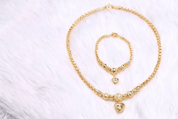 Golden heart pendant , Neck lace, Golden bracelet — 스톡 사진