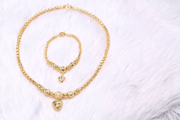 Golden heart pendant , Neck lace, Golden bracelet — 스톡 사진