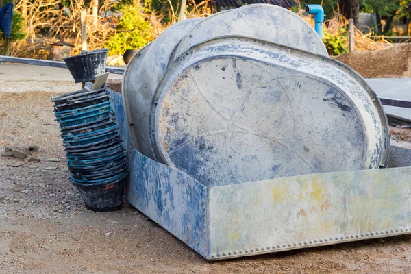 Salvers and buckets after using in construction site, horizontal photo — Stock Photo, Image