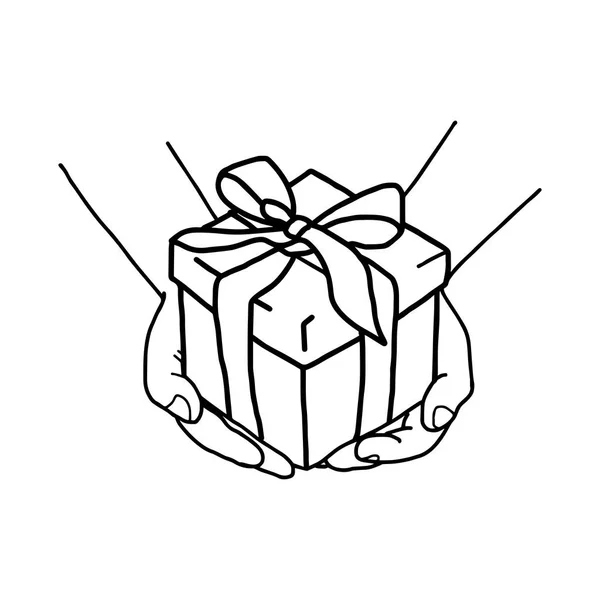 Illustration Vektor Hand gezeichnet Doodle der Hand hält eine Geschenkbox mit Schleife — Stockvektor