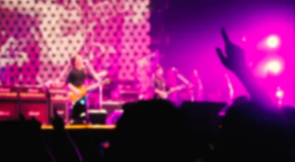 colorful defocused blurred concert people crowd background.