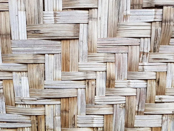 Pattern of old Thai house wall for background and texture. Made of bamboo plant stalks. — Stock Photo, Image