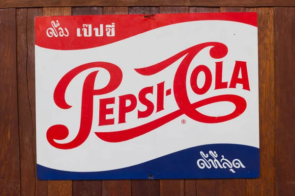 BANGKOK, THAILAND - JULY 14 : vintage retro poster of Pepsi Cola on wooden background on July 14, 2017 in Bangkok, Thailand — Stock Photo, Image