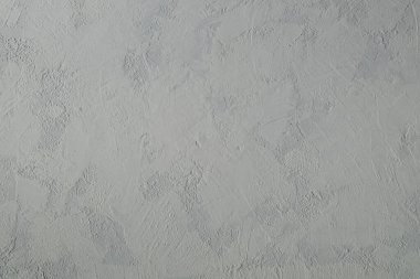 Gri alçılı bir yüzey biçiminde arkaplan.