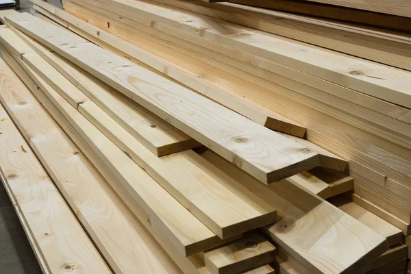 Lumber from the boards in the warehouse or in the store for construction.