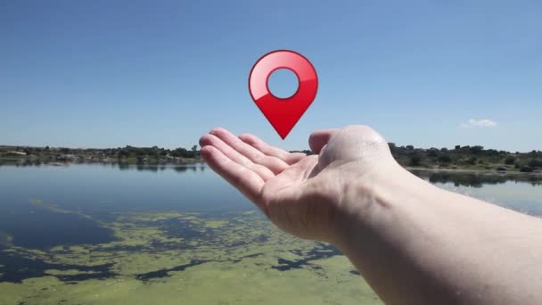 Hand Geolocation Map Icon Water Filled Background Blue Sky — Stock Video