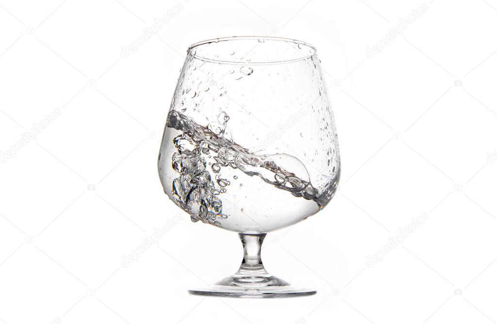 cup filling them with water on a white background