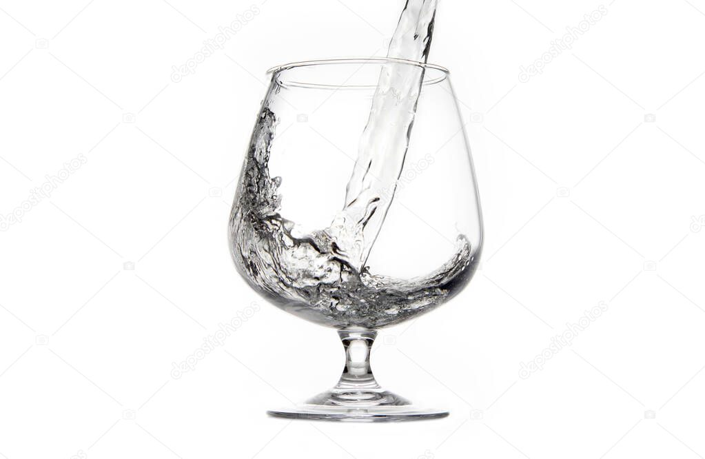 cup filling them with water on a white background
