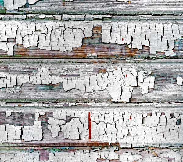 Wooden boards with peeling off paint — Stock Photo, Image