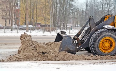 Yolun bir CIT Tarih üzerinden kar temizleyen traktör parçası
