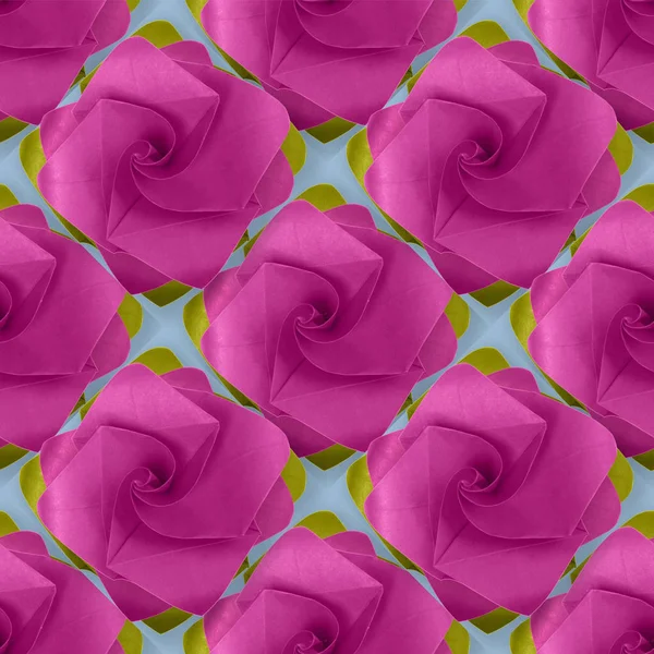 Origami en papier rose violet rose à la main sur motif bleu Image En Vente
