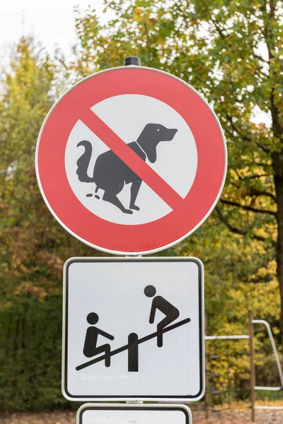 Sign No Dog Poop in a playground