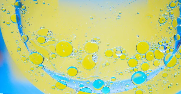 Círculos Aceite Sobre Fondo Azul Agua Amarillo Fondo Abstracto Para —  Fotos de Stock